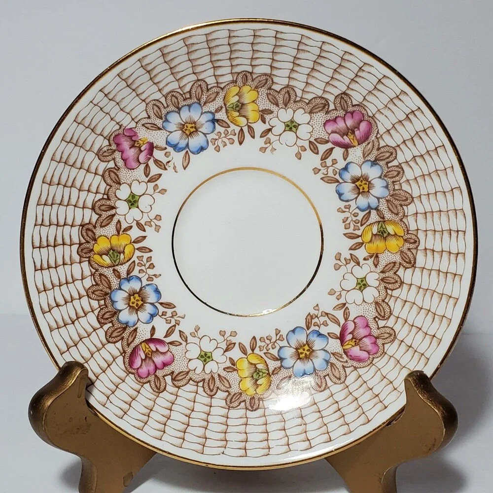 Rosina Teacup and Saucer Floral Basket Weave Pink Blue Flowers Vintage
